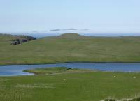 View towards Loch of Watsness with Foula in the distance