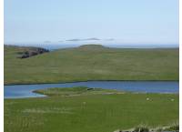 View towards Loch of Watsness with Foula in the distance